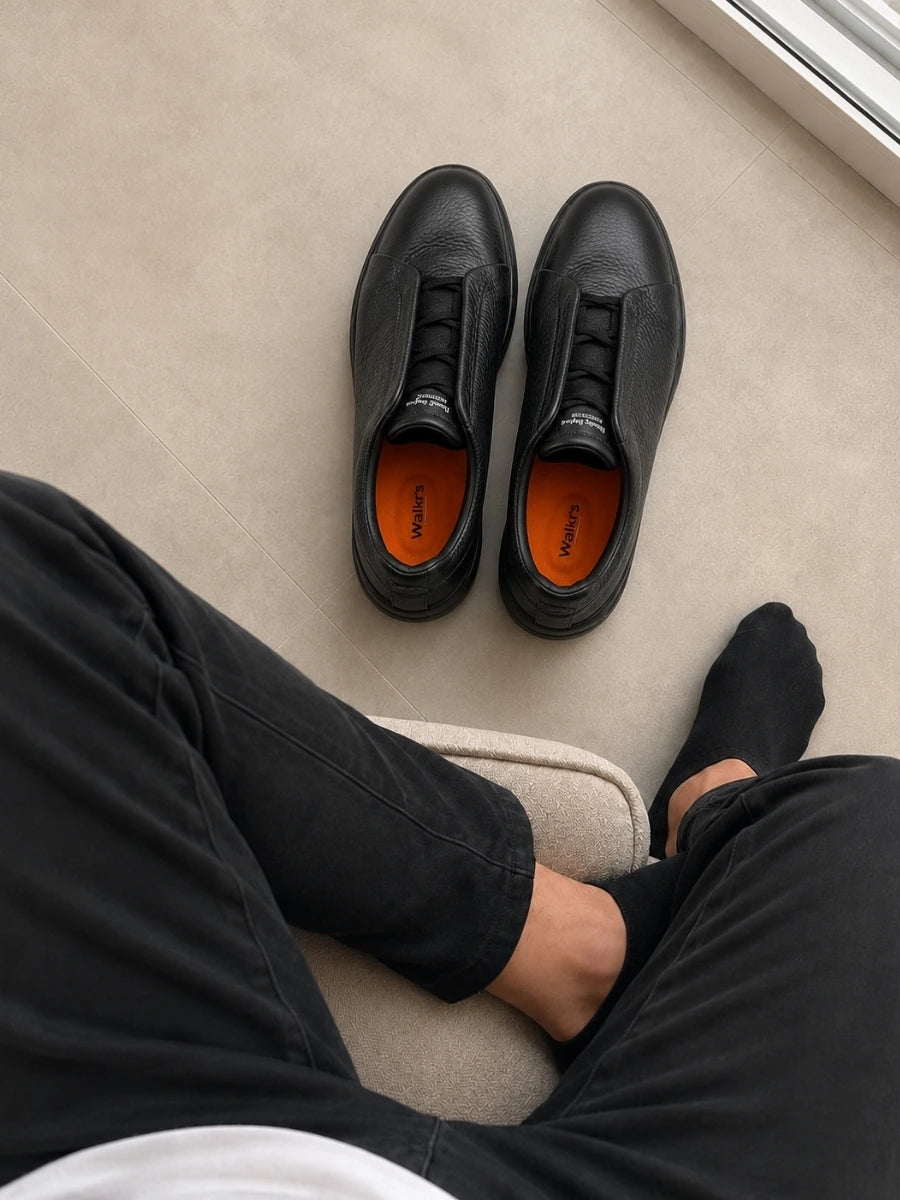 Walkrs insoles inside a customer's leather shoes
