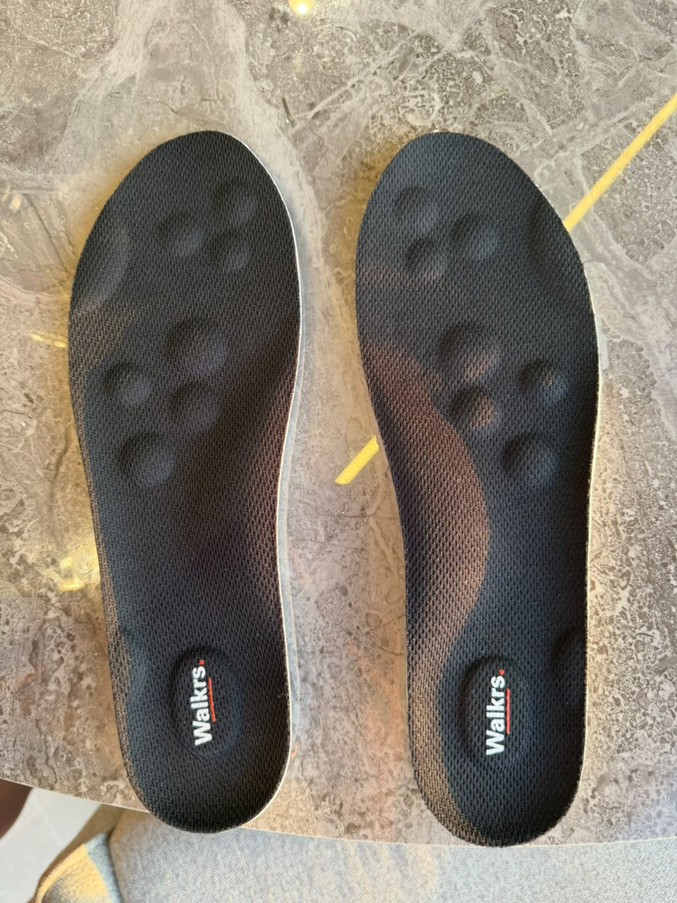 Customer using Walkrs insoles